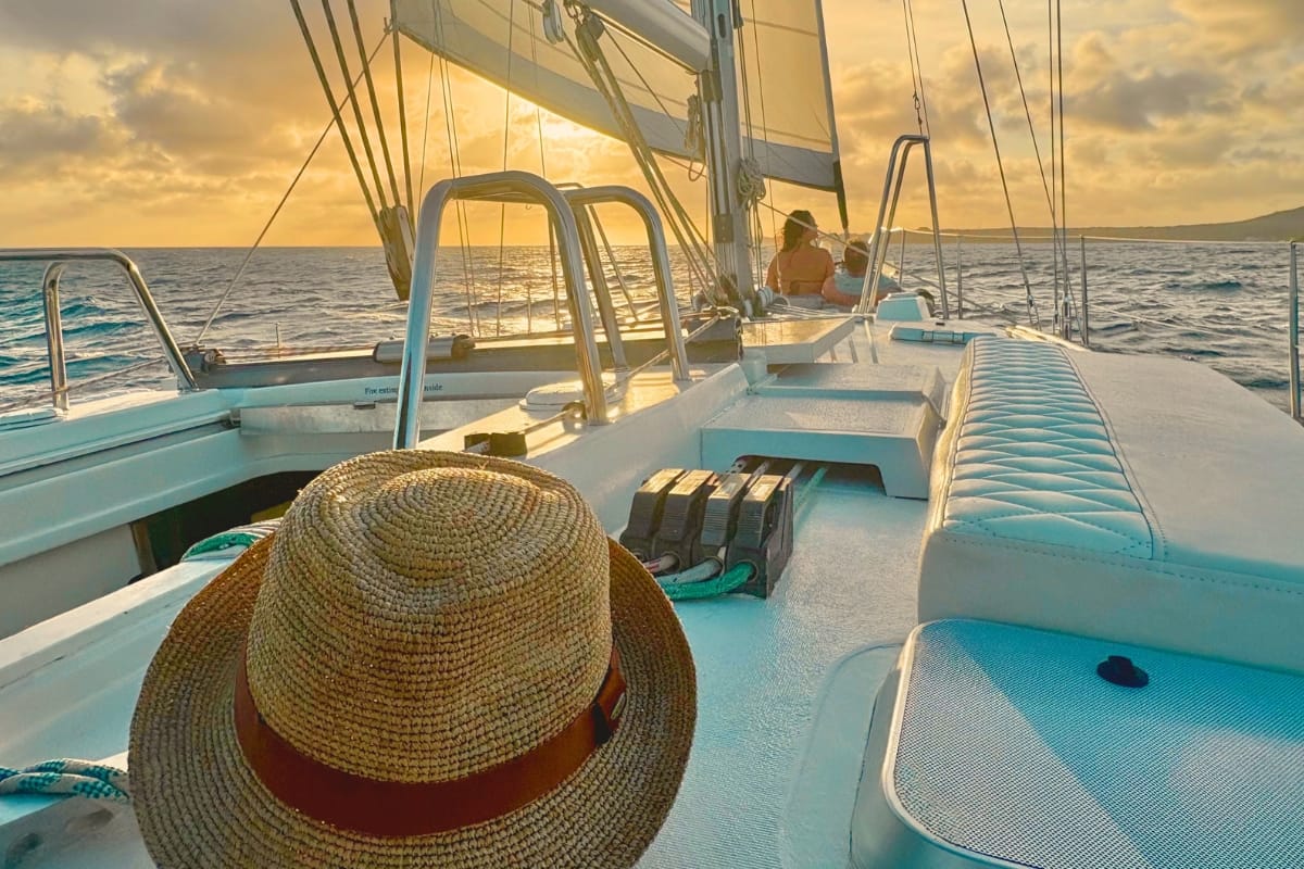 couple enjoying sunset while relaxing on sailing yacht galaxie