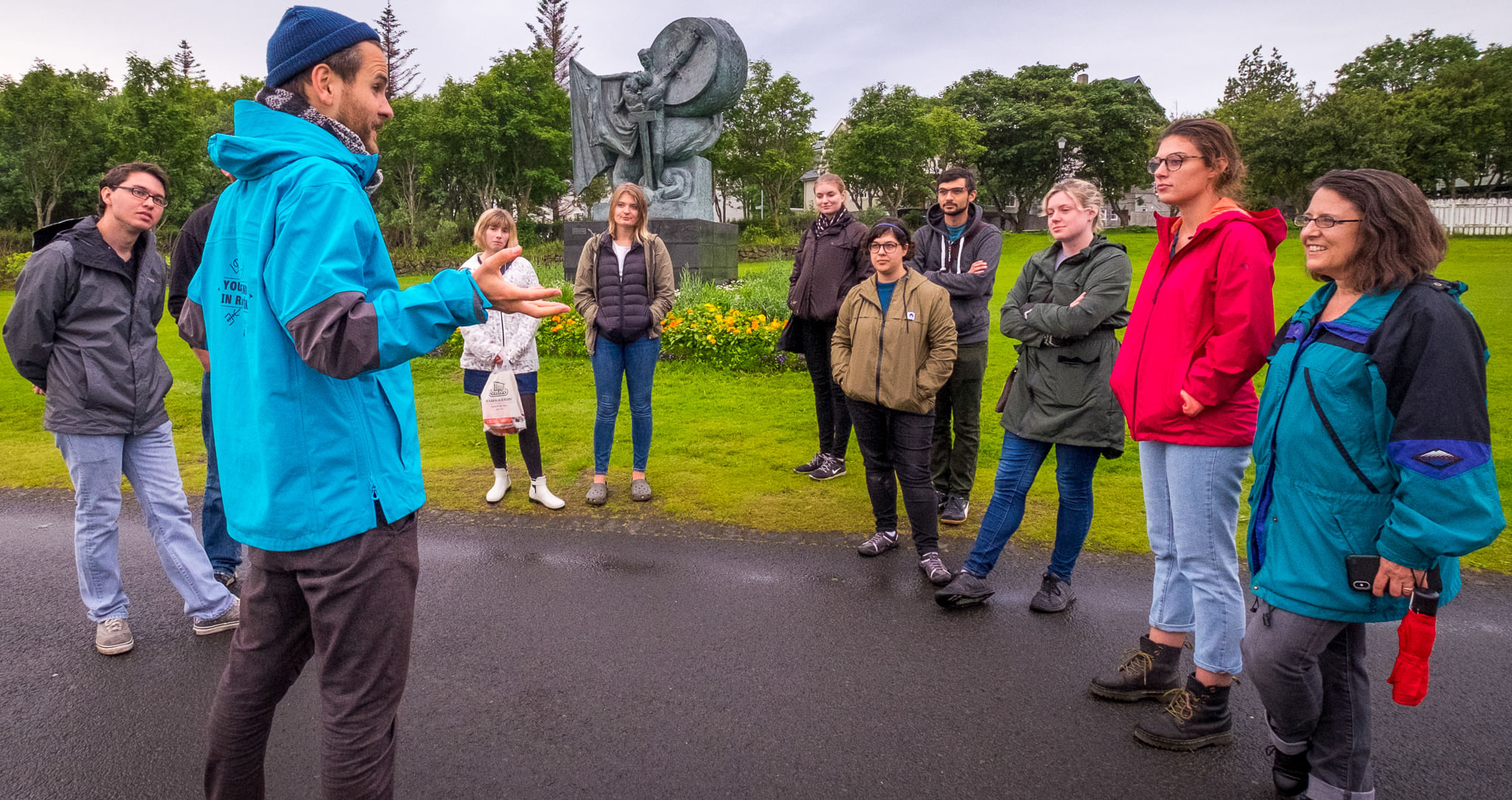 A group of guests listening to the guide from Your Friend in Reykjavik