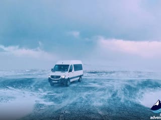 A van that takes travels around during day south coast tour Iceland