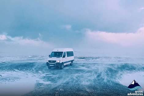 A van that takes travels around during day south coast tour Iceland