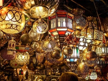 The souks of Marrakech are vibrant markets filled with narrow, winding streets where vendors sell everything from spices and textiles to jewelry and handcrafted goods. They are a bustling hub of tradi