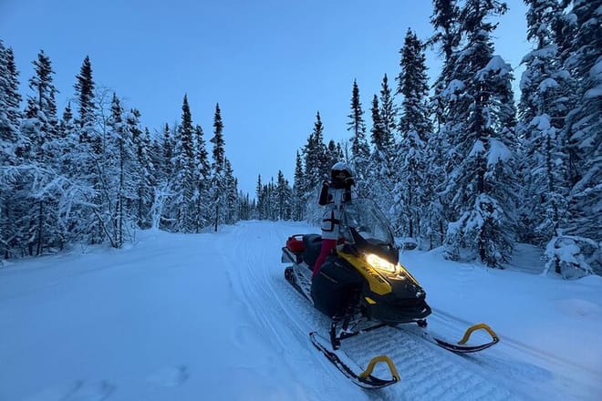 Snowmobile Riding Adventure in Golden Town photo 3