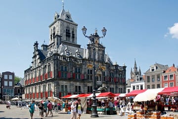 Explore Delft's Historic Streets and Market Square on Foot