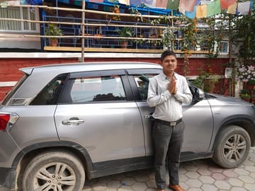 Airport Pick Car and Nepali Namaste with Our Security Guard.