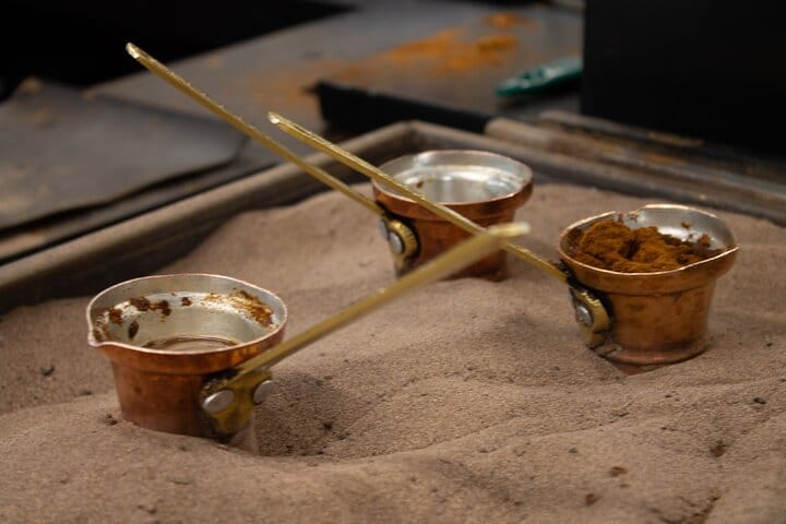 Greek coffee cooked in volcanic sand