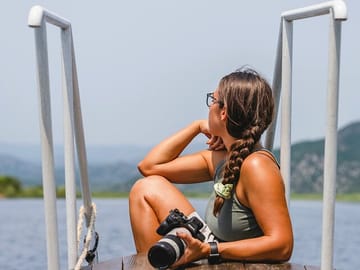 A tranquil view of Lake Skadar's shimmering waters, a haven of beauty and serenity.