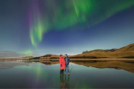  The founders and owners of Aurora Reykjavík under the Northern Lights