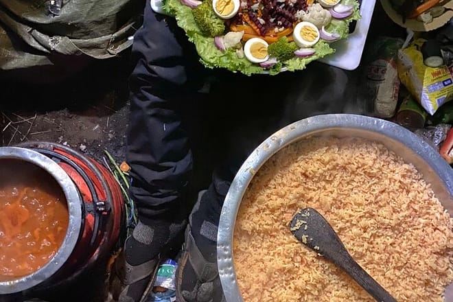 A delicious spread of guest-made Pilau and Kachumbari, showcasing the results of a hands-on local cooking experience.