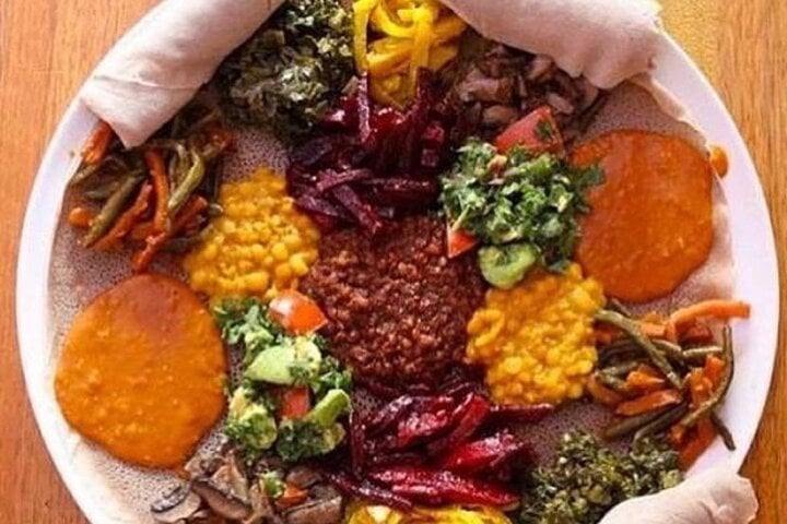 Beyaynetu” or “fasting food combination” you can see cabbage with potatoes; beets; gomen (similar to collard greens); lentils, spicy and non spicy; chick peas, spicy and non spicy; and shiro, a stew