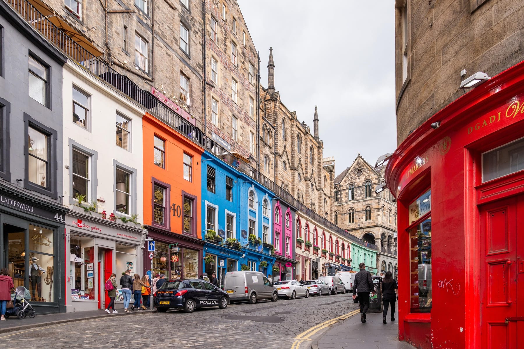 Victoria Street in Edinburgh, a curving row of brightly painted shopfronts