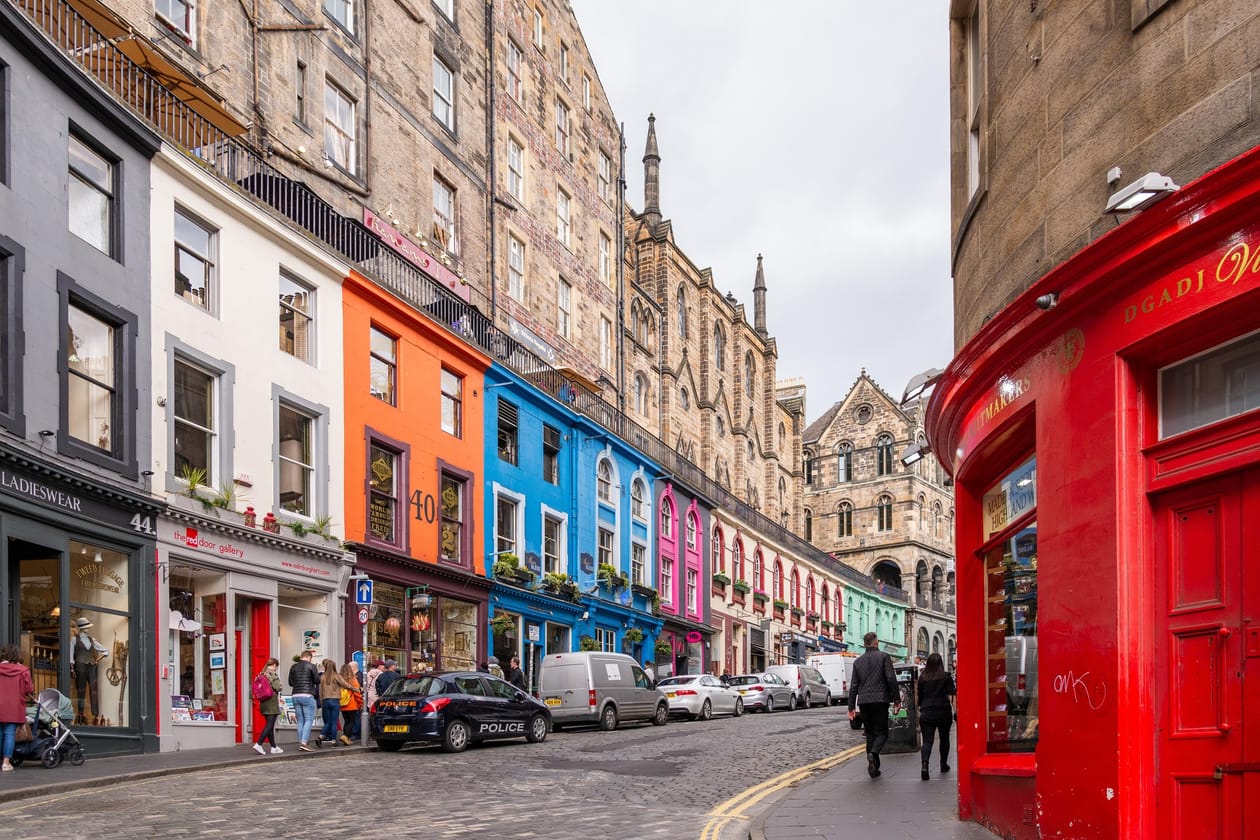 Victoria Street in Edinburgh, a curving row of brightly painted shopfronts