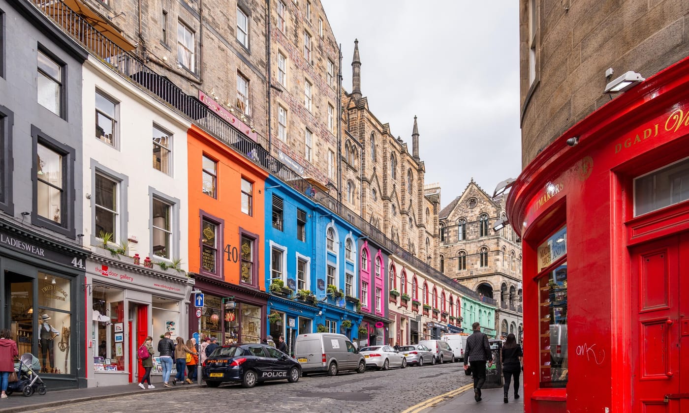 Victoria Street in Edinburgh, a curving row of brightly painted shopfronts