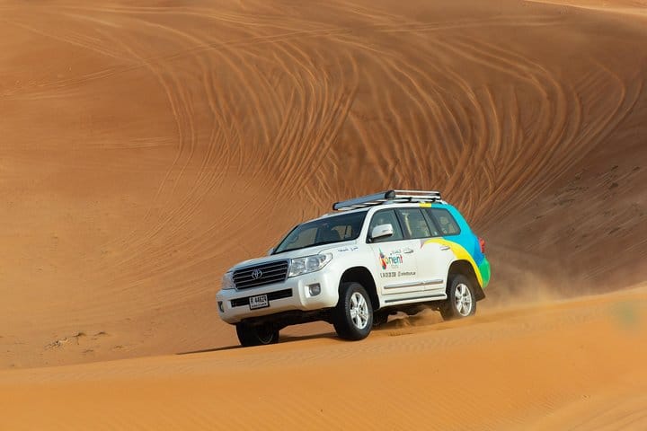 Off-road vehicle takes travelers around the Dubai desert.