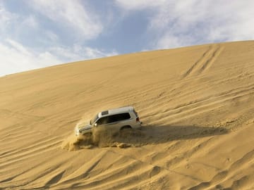Dubai Evening Desert Safari with Dune Bashing & BBQ Dinner