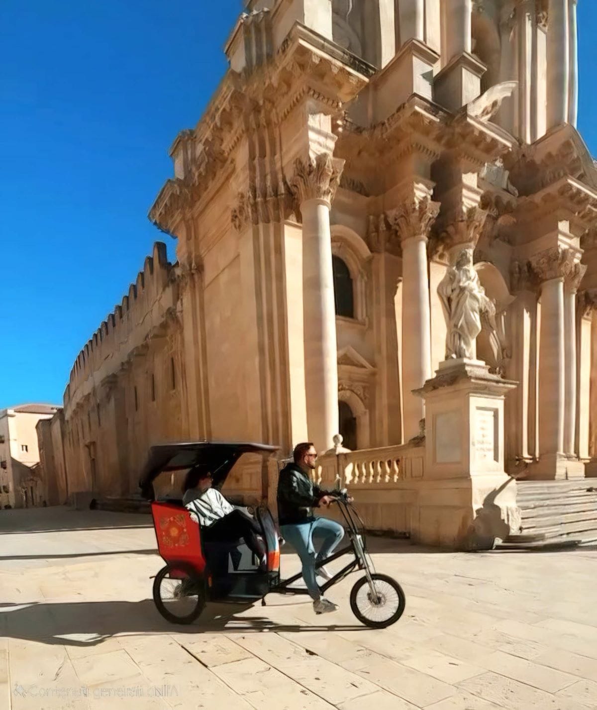 Tuk tuk tour in front of Ortigia Cathedral