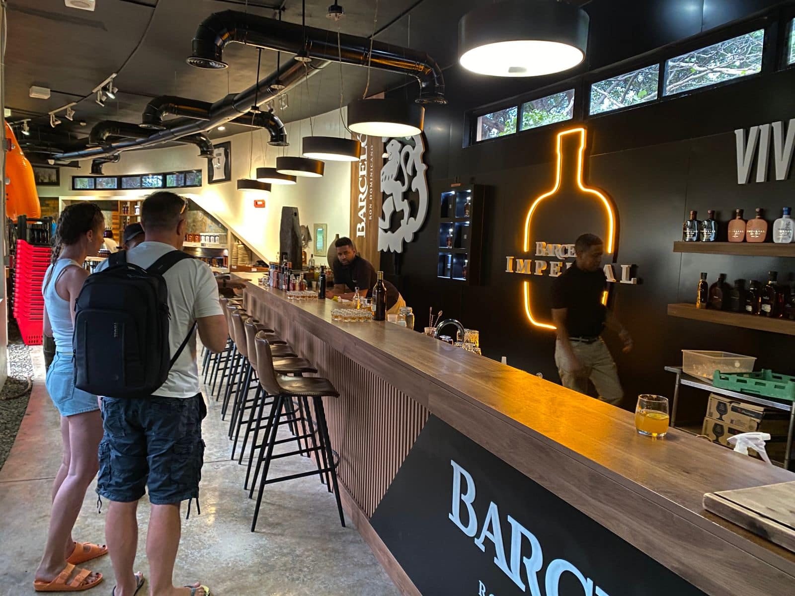 Visitors at the Imperial bar tasting rum during the tour at the Ron Barceló Historical Center.