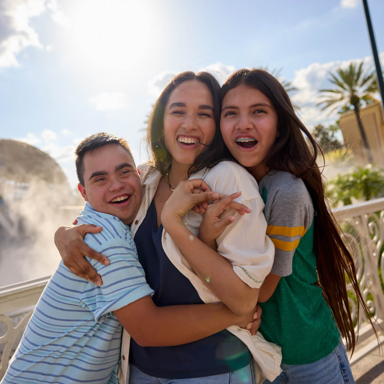 Family beside the Universal globe