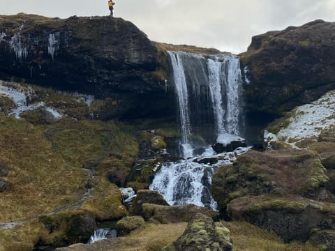 Person standing over Selvallafoss