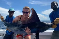 Catch world-class game fish on a private charter, then relax on the stunning white sands of Kendwa Beach, Zanzibar!
