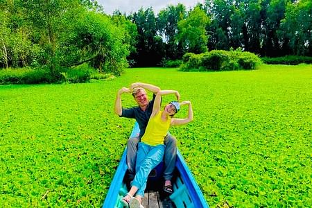 Mekong Romantic Experiences: Nature Reserve Exploration & Floating Market Adventure