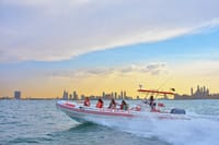 Catch the stunning Dubai skyline at sunset as you race across the waves aboard the exhilarating LOVE BOATS Speedboat!