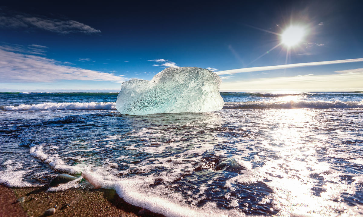 Iceberg coming to shore at Glacier Lagoon