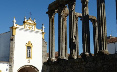 Explore Evora's Roman Temple, Cathedral, and Historic Center
