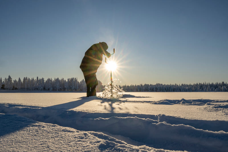 Ice fishing in Ruka