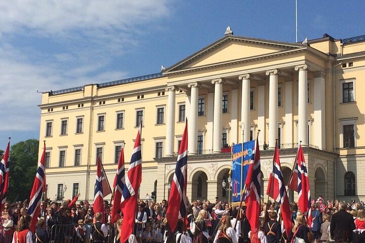 Royal palace with many flags outside