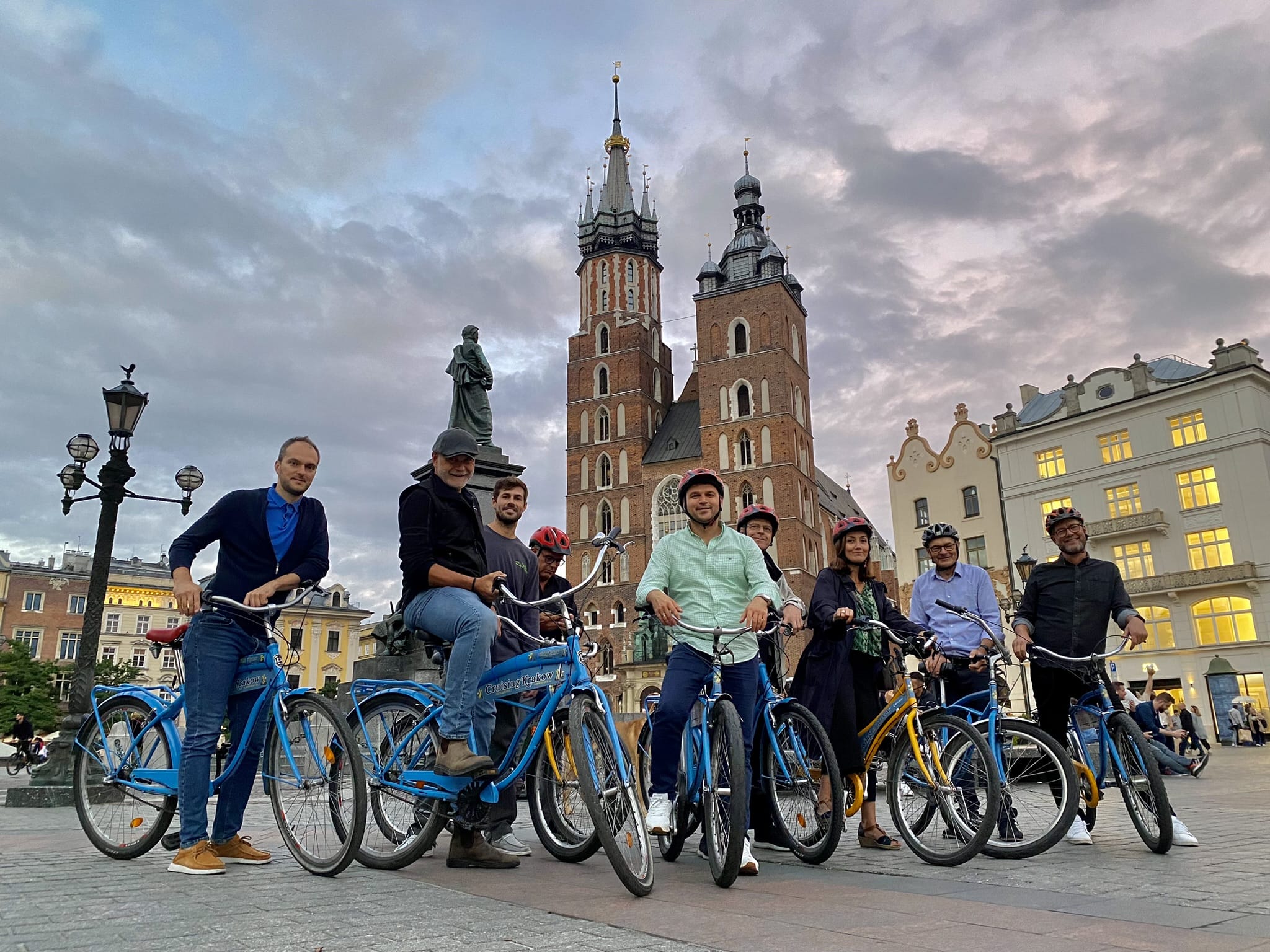 Krakow communist tour — cyclists on guided bike tour through historic district