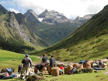 Trekking staff getting ready to load up the pack animals