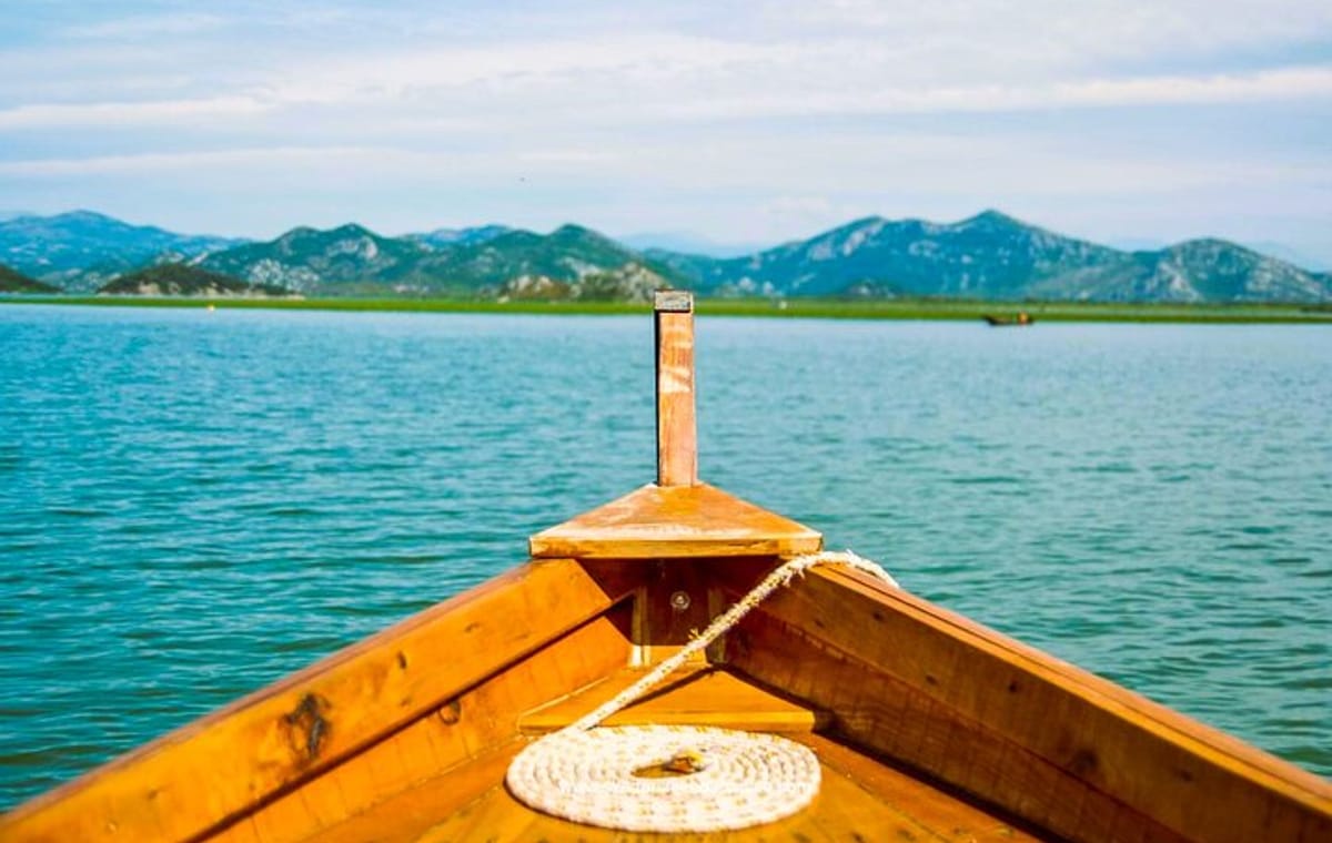 Skadar Lake Sunset Boat Tour: Wildlife, Wine, and Wooden Boat