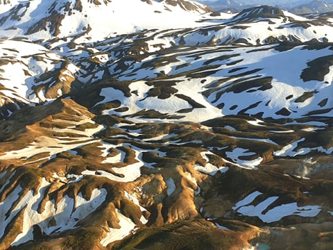 Landmannalaugar mountains covered with patches of snow