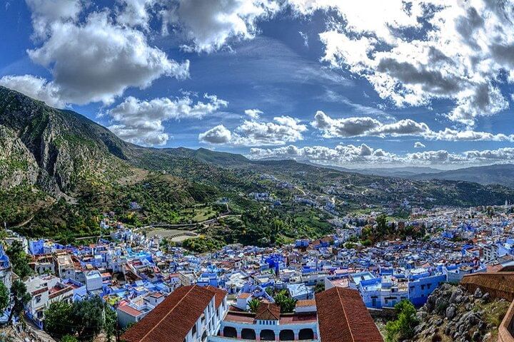 Sc EN ic drive through the majestic Rif Mountains en route to the famous blue city. Panoramic vistas guaranteed!