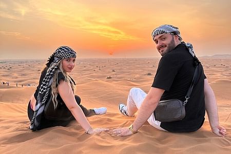 Morning Desert Safari in Dubai: Quad Bike Adventure, Sandboarding & Camel Ride