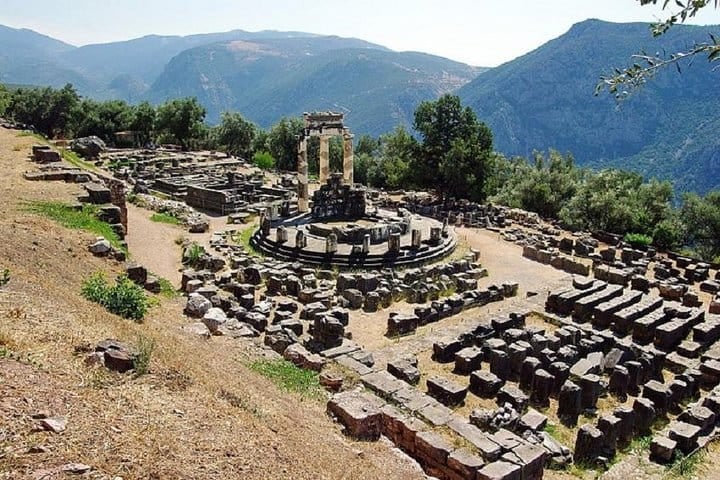 Ancient ruins at Delphi with mountains behind