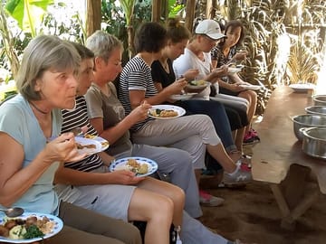 Enjoying a delicious, locally prepared meal with the group—a highlight of our cultural immersion.