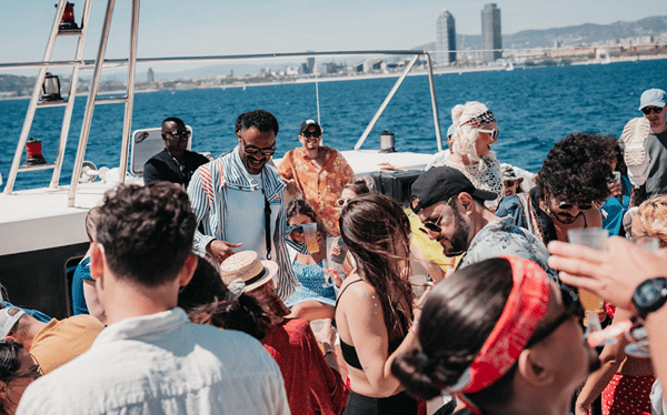 The deck party with the Barcelona skyline behind