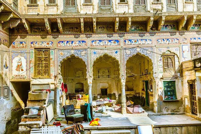 People in beautiful old haveli in Mandawa