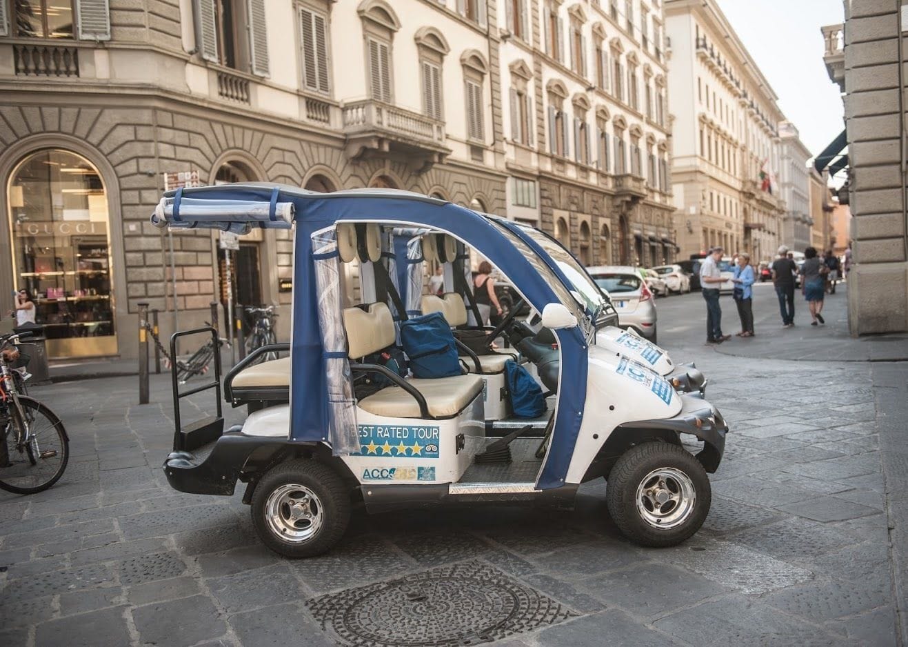 Electric golf cart in Florence city centre