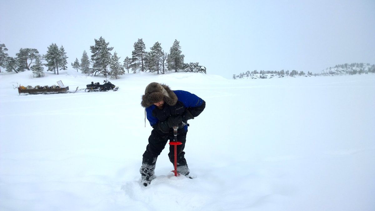 Ice-fishing takes place through hole made in the ice