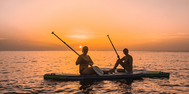 Sunset Experience onboard a Paddle Surf from Cala Portinatx