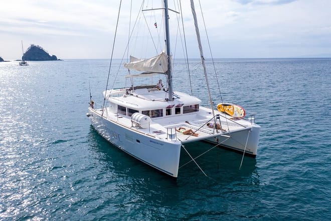 Catch the gentle morning breeze as you sail and swim on the ultimate private catamaran excursion in Costa Rica.