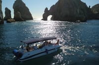 Circle the magnificent Cabo Arch and explore hidden coves aboard your sleek private yacht!