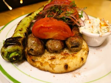 Taste authentic Greek souvlaki at a traditional local eatery.