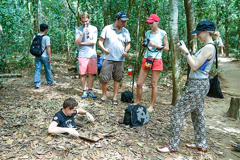 Guests visiting Cu Chi Tunnels with Travelmates
