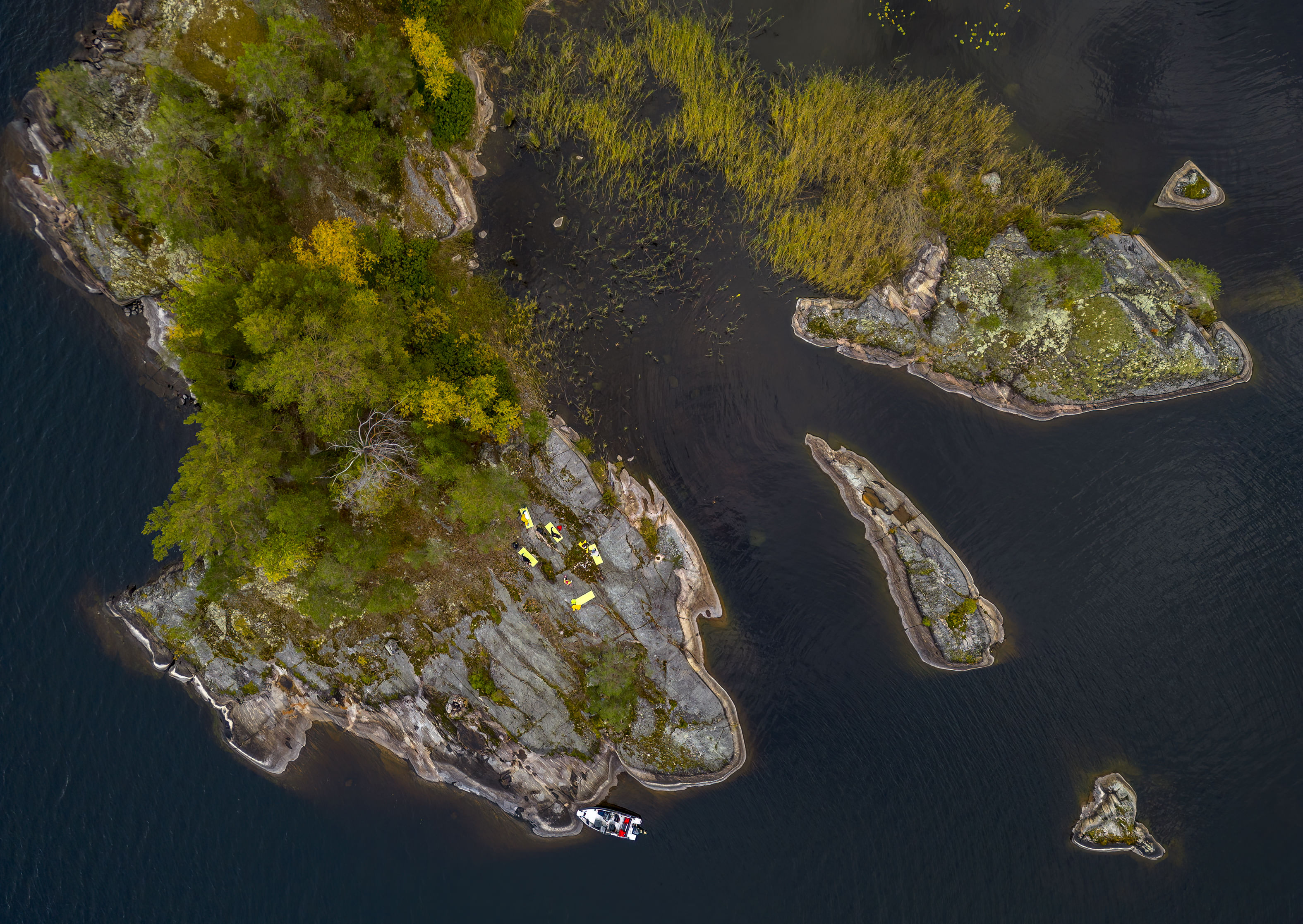 An island with people doing yoga exercises