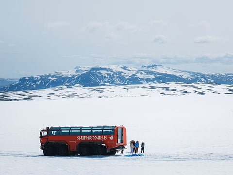 Red Truck on Glacier, with Munt Blafell in the background