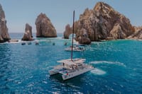 Set sail on a private catamaran in Los Cabos and cruise past the iconic Arch. Enjoy breathtaking views, refreshing drinks, and an unforgettable adventure on the water.