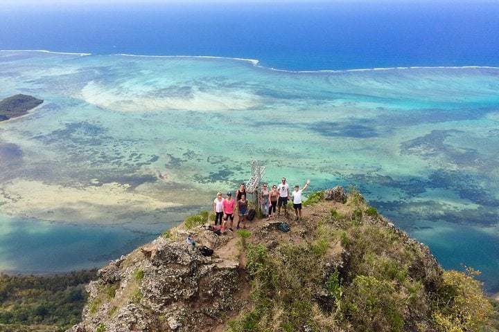 Hikers on the summit of Le Morne Brabant with Yanature, Mauritius